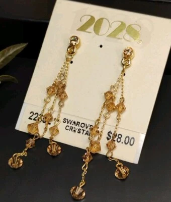 Pendientes colgantes de diseñador NOS 2028 2,5" hechos con cristales de Swarovski beige tono dorado Foto 1 de 4