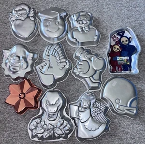 1970er Set 11 Spezialitäten 3D Wilton Kuchenformen Dinosaurier Engel Fußball & mehr - Bild 1 von 5