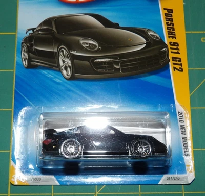 2010 Hot Wheels New Models - Porsche 911 GT2 - Black w/ Protector - Image 1 of 3