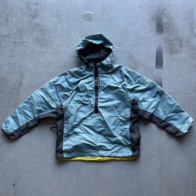 Chaqueta cortavientos vintage Nike Light Rain años 90 verde azulado/negro media cremallera Foto 1 de 4