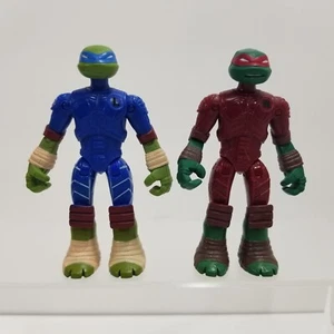 Playmates: Teenage Mutant Ninja Turtles - Mutations Leonardo & Raphael Figures - Picture 1 of 6