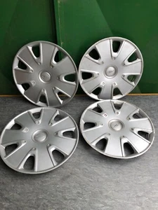 FORD FIESTA SET 4 COPRICERCHI AUTO COPPA RUOTA COPRIRUOTA COPRIMOZZI BORCHIE 15” - Imagen 1 de 5