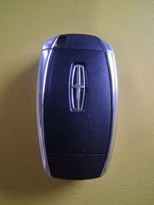 LINCOLN KEY FOB OEM PRE-OWNED  5-BUTTON - Foto 1 di 3