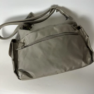 Travelon 女式流浪汉斜挎包钱包石灰色绿色尼龙拉链新品 — 第 1/4 张图片