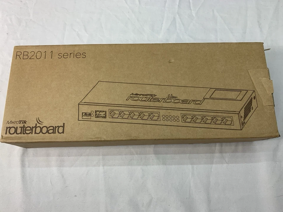 MikroTik Routerboard RB2011iL-IN 600MHz 64MB 5xLAN 5xGb Desk L4 *NEW IN BOX* - Image 1 of 4