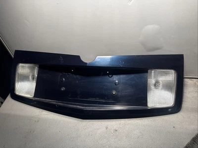 2003-07 Cadillac CTS license plate /reverse lights rear lamp, black finish panel - Image 1 of 4