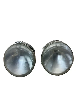 Par de faros conjuntos Porsche 911 H-5 1985-94 parte # 911 631 119 00 Foto 1 de 4