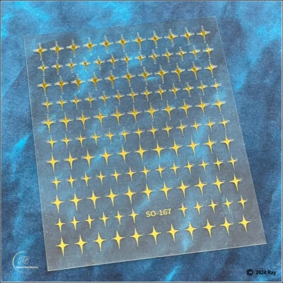 Calcomanías de uñas autoadhesivas de estrellas de cuatro puntas de 5 colores con estrellas de 4 puntas Foto 1 de 3