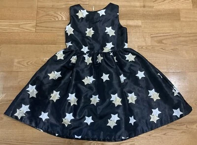 Vestido para niñas Gymboree negro para ocasiones especiales con estrellas doradas y blancas talla 7 usado en excelente estado Foto 1 de 3