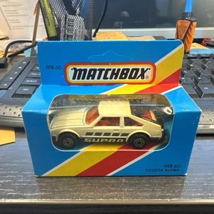 1/64 MATCHBOX SUPERFAST VINTAGE 1981 RARE TOYOTA SUPRA MB60 WHITE/BLACK/BLUE - Picture 1 of 6