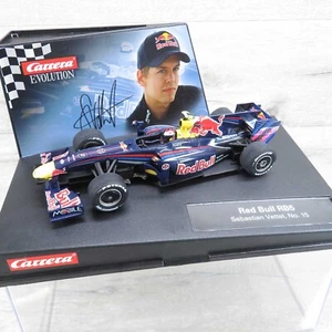 CARRERA EVOLUTION 27324 - 1:32 - Red Bull RB5 Sebastian Vettel - OVP - #AL85934 - Bild 1 von 8