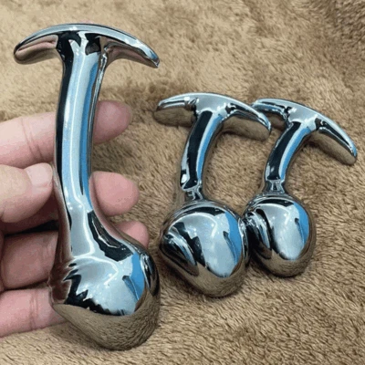 Masajeador de próstata anal con tapón de glúteos de metal de acero para hombres mujeres Foto 1 de 4