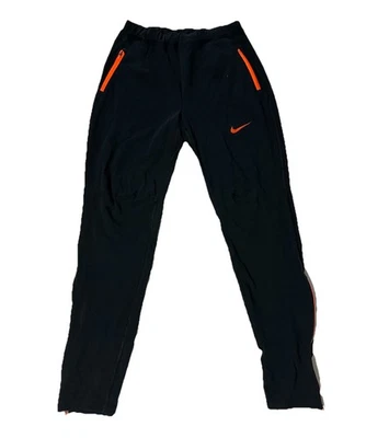 Nike Correr Joggers Hechos en EE. UU. Negro/Naranja DA4371-022 Para hombres Talla Mediana Foto 1 de 4