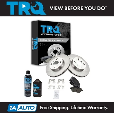 Kit delantero de pastillas de freno y disco de rotor de cerámica TRQ con productos químicos para Scion xA xB Foto 1 de 4
