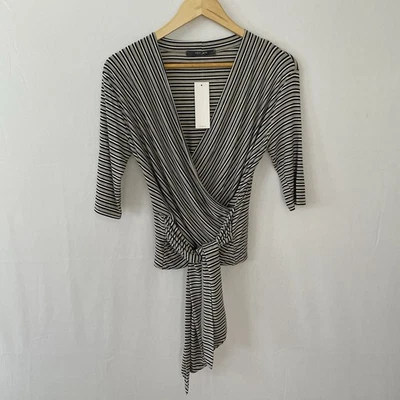 Camiseta deportiva para mujer COIN 1804 mediana tejida imitación envoltura manga codo negra blanca tostada Foto 1 de 4