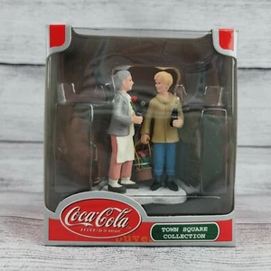 Figura Accesorio Pueblo Navidad Plaza Pueblo COCA-COLA, Amigos con Flores - Imagen 1 de 2