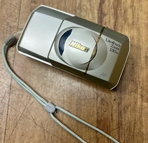 Nikon Lite Touch Zoom 130 ED 35mm Film Point & Shoot Camera Silver Tested - Picture 1 of 4
