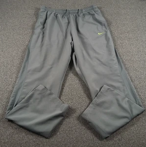 Pantalones deportivos Nike cortavientos para hombre talla XL bordados Swoosh Dri Fit grises - Imagen 1 de 11