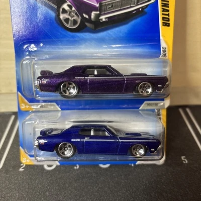 Hot Wheels 69 Cougar Eliminator Lot of 2 Blue And Purple New Models - Image 1 of 4