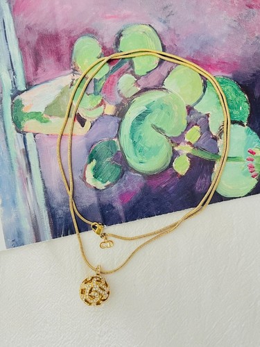 Collana lunga Christian Dior vintage 1980 sfera sfera cristalli traforati pendente