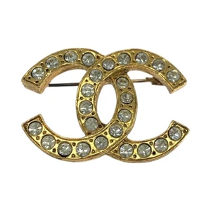 Broche CHANEL Vintage Marca COCO Estrás Metal Dorado CC - Imagen 1 de 10