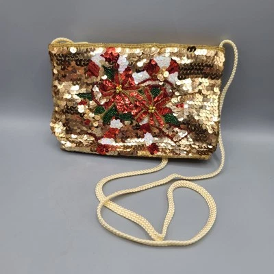 Bolso sin asas Magid vintage de lentejuelas doradas bastón de caramelo correa navideña Foto 1 de 4