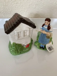 WIZARD OF OZ JUDY GARLAND AS DOROTHY WICKED WITCH SALT & PEPPER SHAKER SET - Picture 1 of 4