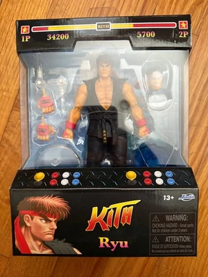 Figura de acción Kith x Jada Toys Street Fighter Ryu Marvel vs Capcom en mano Foto 1 de 4