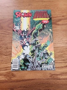 SPAWN / The Savage Dragon #1 Erik Larson QUIOSCO 1996 con pin-up y sello de fecha - Imagen 1 de 11
