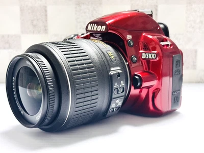 Nikon D3100 14.2MP Digital SLR Camera Red w/AF-S Nikkor DX 18-55mm VR Lens, bag - Image 1 of 4
