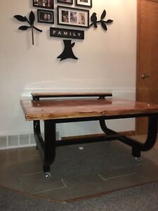 Handmade Industrial Strength Table, beautifully made , has rolling wheels .