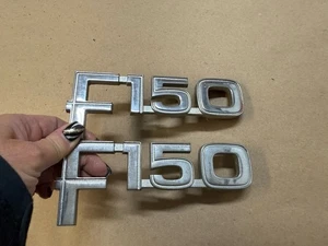 80-86 Ford Truck F150 Emblems Pair 1980-1986 OEM - Picture 1 of 4