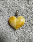 Handmade small amber heart pendant. from natural Baltic amber. Weight 1.2 grams
