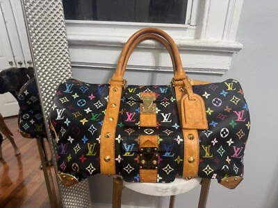 LOUIS VUITTON-Black Monogram Multicolor Keepall 45 Foto 1 de 4