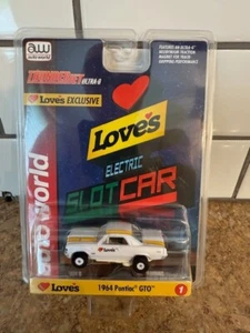 AUTO WORLD THUNDERJET LOVES 1964 PONTIAC G.T.O. iWHEELS 1/64 SLOT CAR - Picture 1 of 2