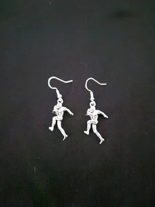 Silver Tone Fashion Dangling Earrings Football Players New - Picture 1 of 1