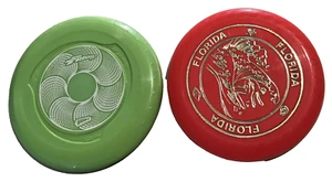 Green Wham-o Frisbee 9" Scheibe & Red Florida Frisbee 9" Scheibe - Bild 1 von 7
