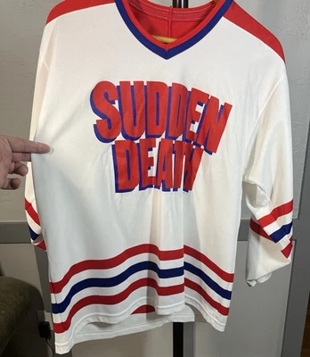 Camiseta deportiva de hockey CCM Sudden Death Van Damme #1 blanca talla grande Foto 1 de 4