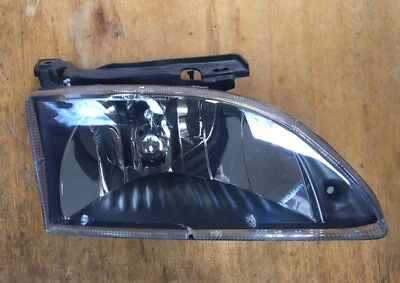 Faro delantero derecho Chevy Cavalier 2001 Foto 1 de 4