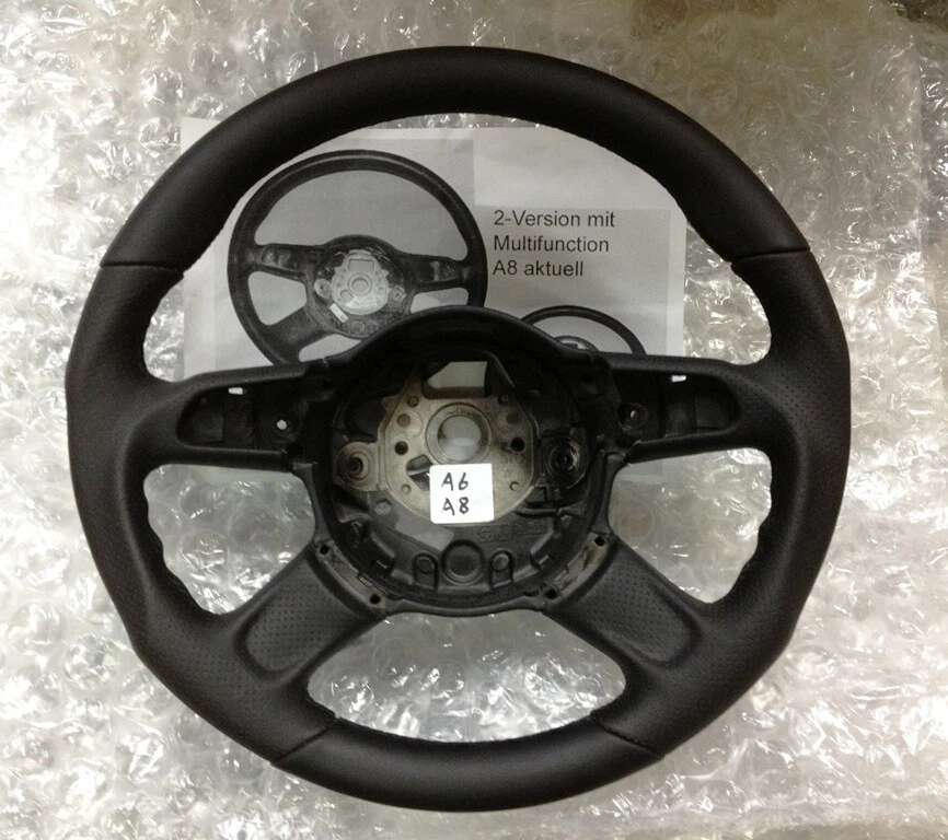 05'-10' Audi A6;A8 volante deportivo napa/perforado A6;A8 con orificio de botón Foto 1 de 1