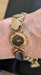 Vtg Women's Bill Blass Wristwatch Black Face Goldtone & Faux Hematite Panels 7" - Picture 1 of 8