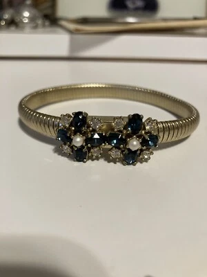 Pulsera Juicy Couture con racimo de cristal azul tono dorado Foto 1 de 3