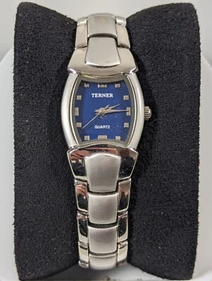 Reloj Bijoux Terner esfera azul tono plata caja rectangular correa acero inoxidable Foto 1 de 4