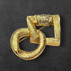 Broche prendedor YVES SAINT LAURENT VINTAGE TONO DORADO ESLABÓN CALADO Estrás Sin Caja - Imagen 1 de 24
