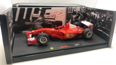  HWEN2074U1 Hot Wheels Elite Ferrari F1-2000 GP Japan M. Schumacher 1/18 - Immagine 1 di 4