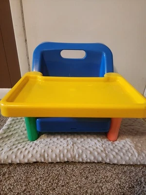 Bandeja silla asiento elevador plegable ahorro de espacio 1st Travel On The Go de colección Foto 1 de 4