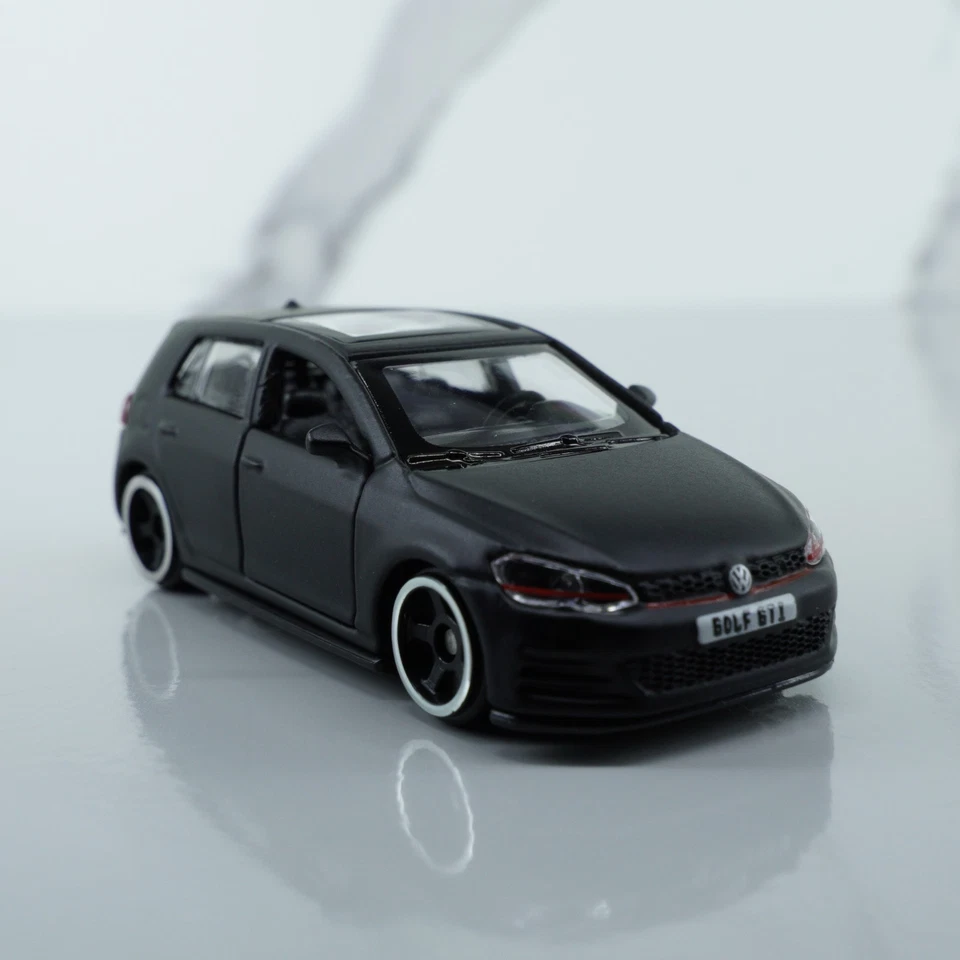 Volkswagen Golf GTI Mk7 2017 - Burago escala 1:64 coche modelo diecast negro Foto 1 de 4
