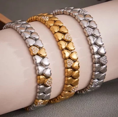 Bracciale elastico da donna in acciaio e zirconi colore oro, argento e bicolore - Immagine 1 di 4