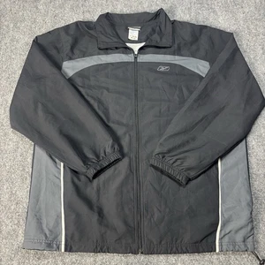 Chaqueta cortavientos vintage Reebok para hombre XL negra y gris cremallera completa nailon pista años 90 - Imagen 1 de 7