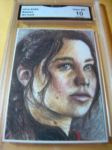 AUTÓGRAFO ARTISTA DE LOS JUEGOS DEL HAMBRE KATNISS EVERDEEN 2015 ACEO ART IMPRESIÓN GRADO 10 - Imagen 1 de 1